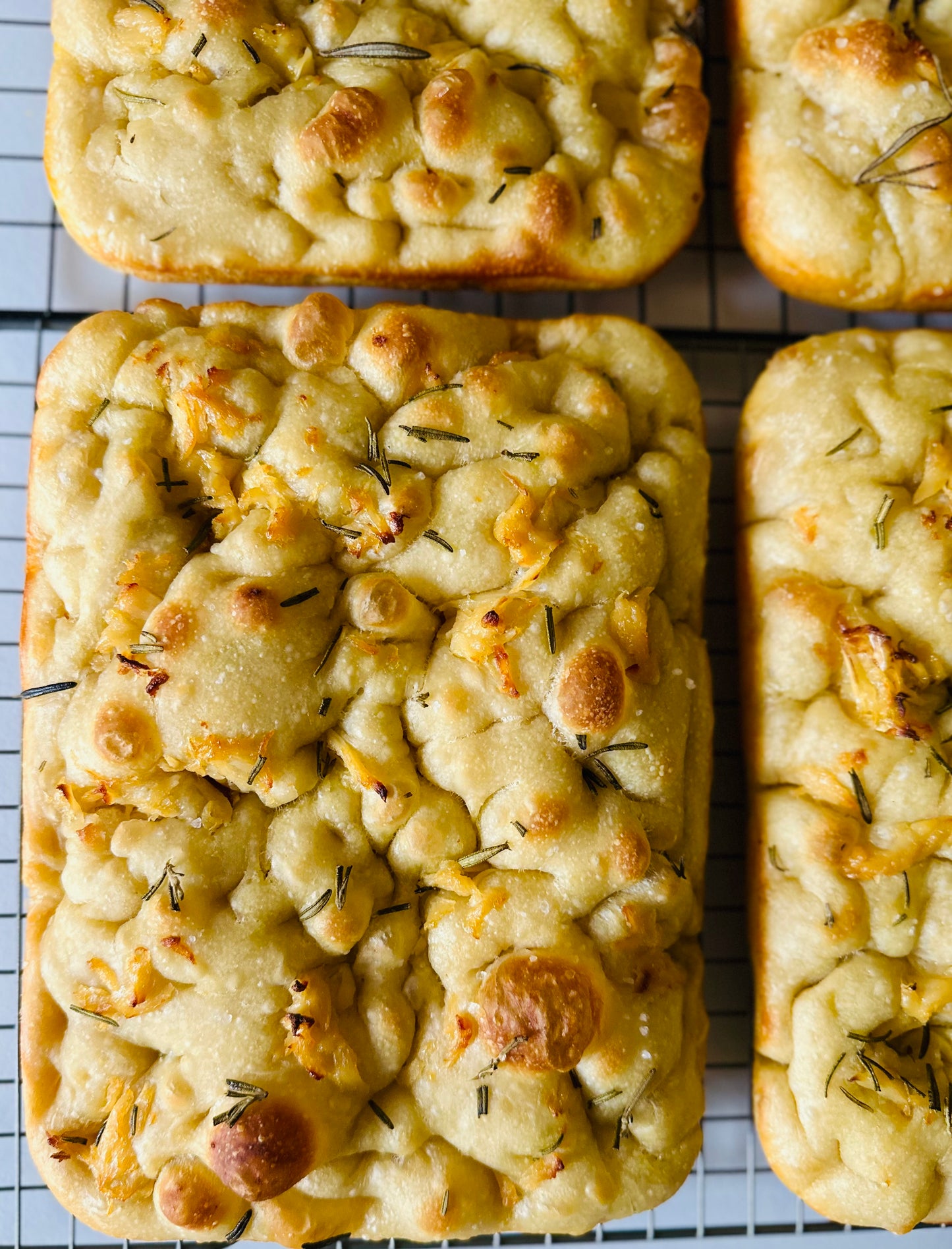Artisan Sourdough Focaccia (includes 2 loaves)- Fresh Rosemary+ Roasted Garlic Loaf