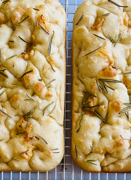 Artisan Sourdough Focaccia (includes 2 loaves)-                                                      Fresh Rosemary+ Roasted Garlic Loaf